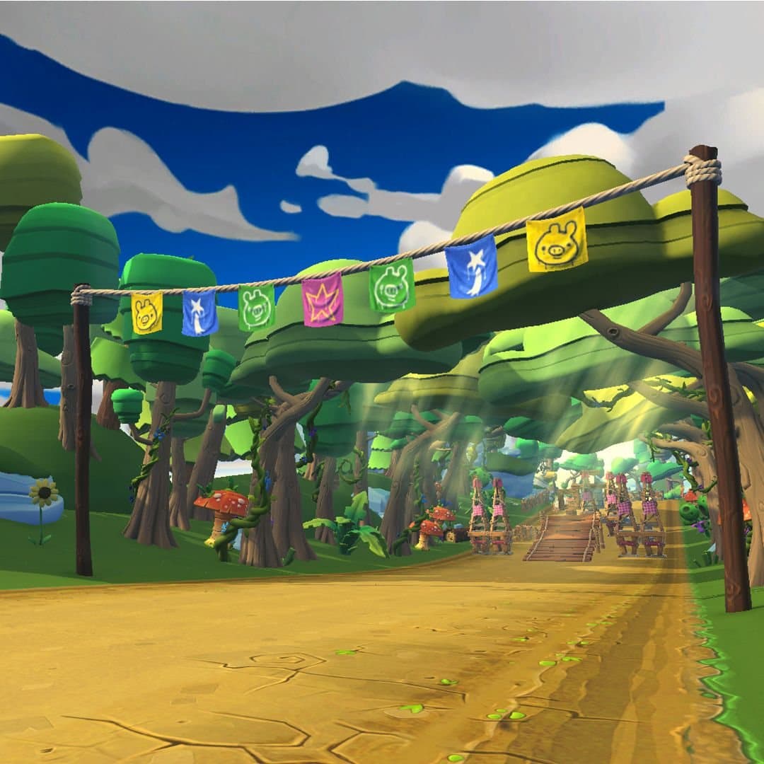 The Feathered Woodlands environment: a dirt track running under a rope of piggy bunting into a canopy of stylised green trees.