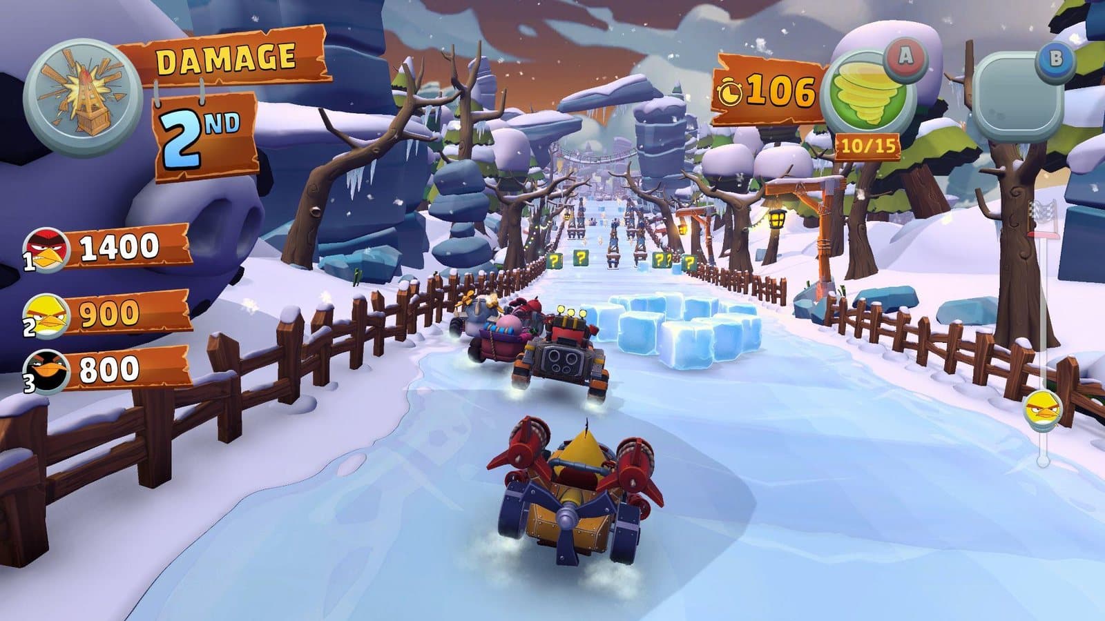 In-race HUD in the Arctic Frost theme, showing the ability charge at 10 of 15 and a run of Question Mark Crates and ice cubes ahead on the track.